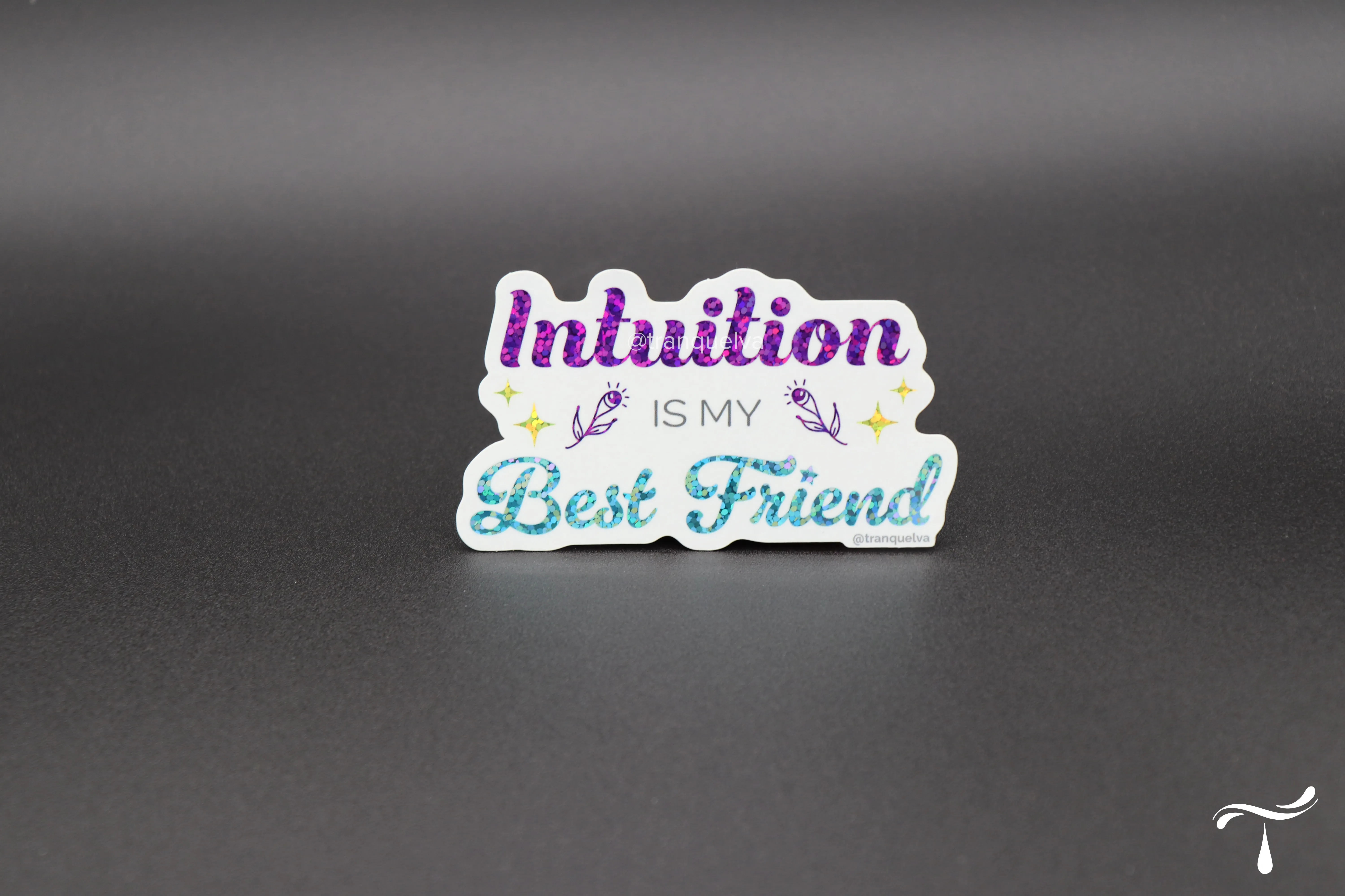 Glitter sticker with the words Intuition is my best friend in purple and teal script